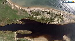 Agrigento, allarme per i fiumi colorati di viola inquinati degli scarti della molitura delle olive